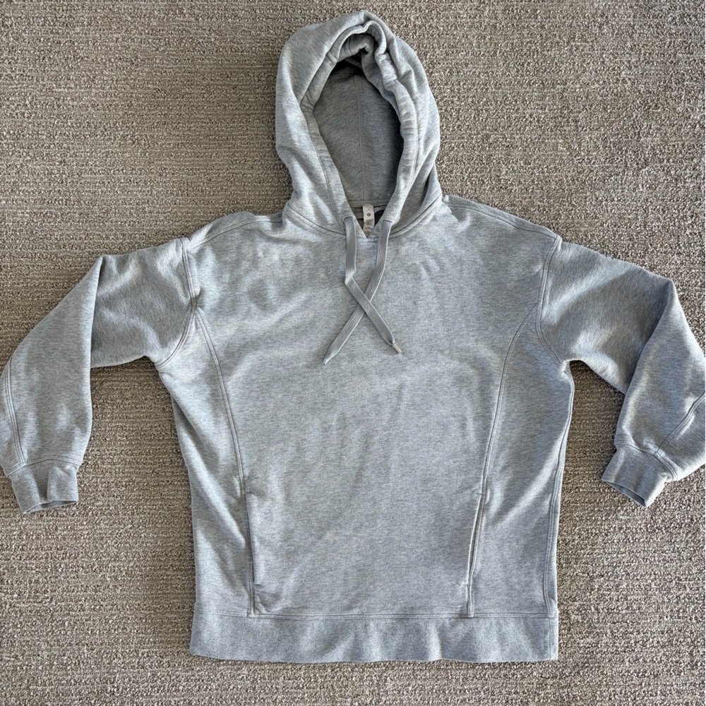 LULULEMON HOODIE IN SIZE 4. Great Condition! No stains or tears.Heather Gray.